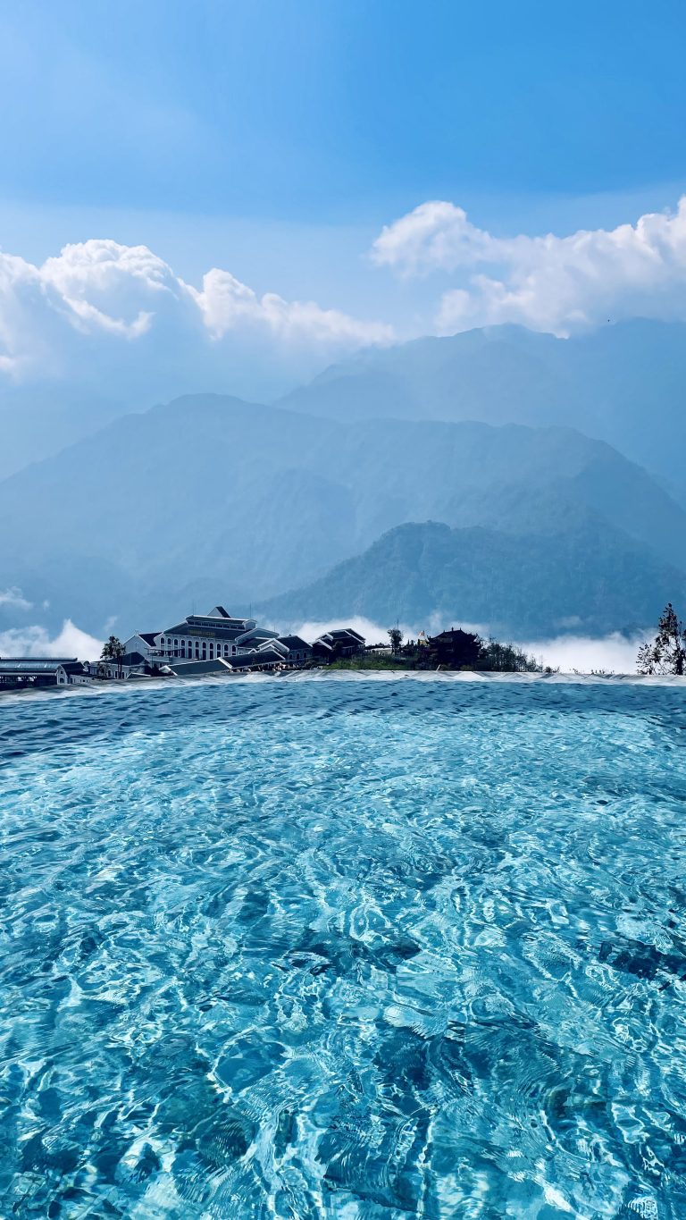 Infinity pool of Lady HIll Resort with the view to the far mountain. It looks like an ink-paint picture